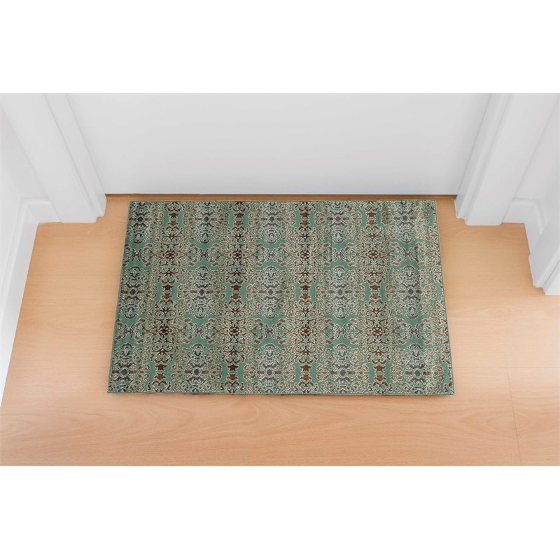 Linon Elegance Snowflakes Polypropylene 2'x3' Rug in Turquoise and Brown