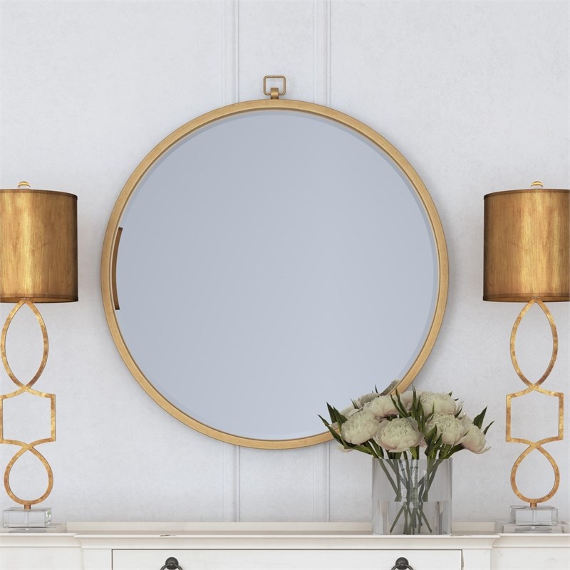 Logaan Metal Wall Mirror in Gold Leaf Finish with Pocket Watch Details