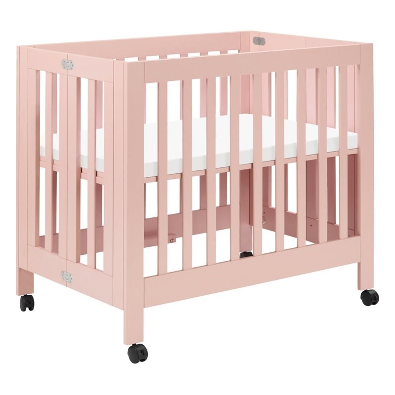Babyletto Origami Portable Folding Mini Crib with Casters in Petal Pink