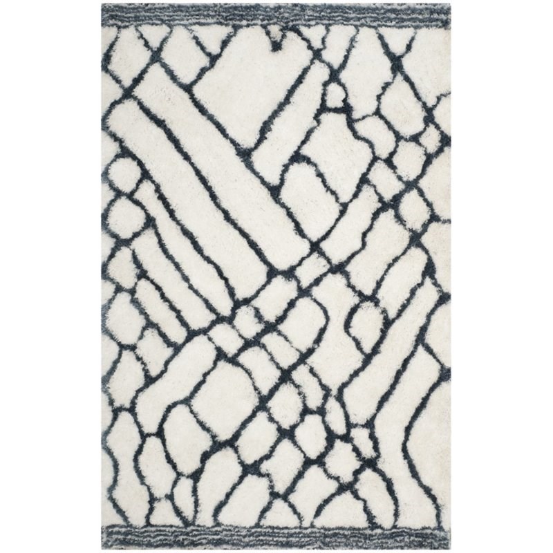 Safavieh Toronto Shag 5' X 8' Hand Tufted Rug in Ivory and Blue