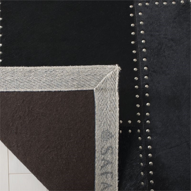 Safavieh Studio 5' x 8' Hand Woven Leather Rug in Black