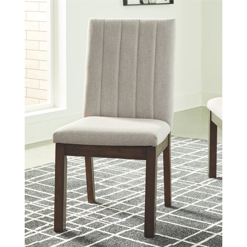 signature design by ashley dellbeck upholstered dining chair in beige