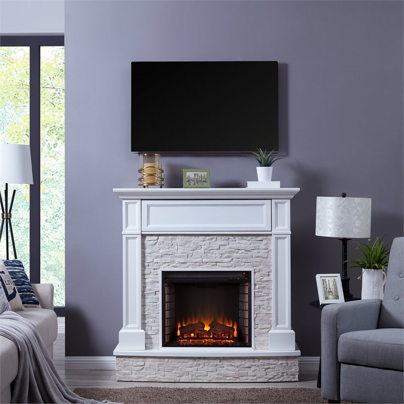 SEI Furniture Jacksdale Faux Stone Electric Fireplace TV Stand in White