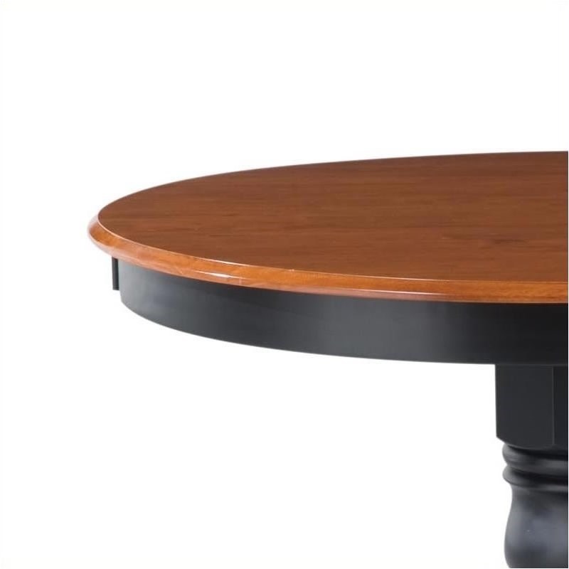 Bowery Hill Round Pedestal Dining Table in Black and Cottage Oak