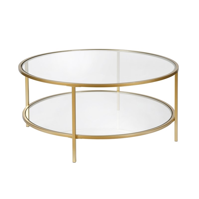 Henn&Hart Round Metal Base Coffee Table in Brass with Glass Top