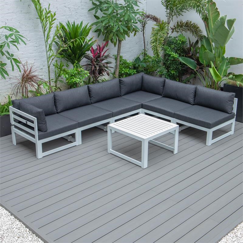 LeisureMod Chelsea 7-Piece White Patio Sectional With Coffee Table in Black