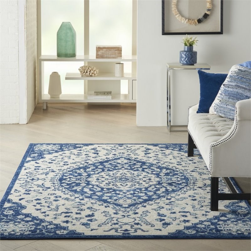 HomeRoots 4' x 6' Medallion Polypropylene Fabric Area Rug in Ivory/Blue